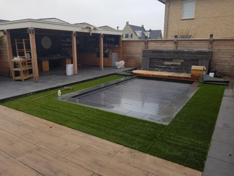 Complete tuin met overkapping